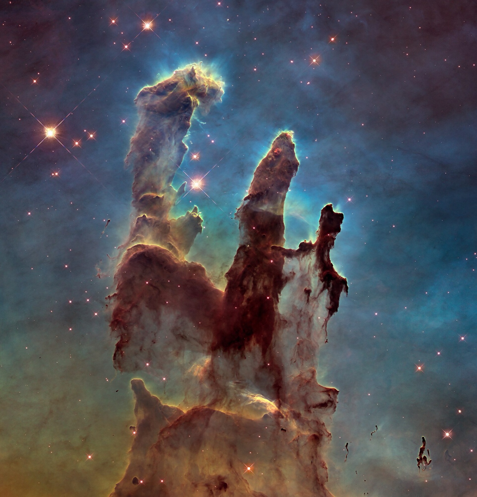 The Pillars of Creation in the Eagle Nebula, imaged by the Hubble Space Telescope